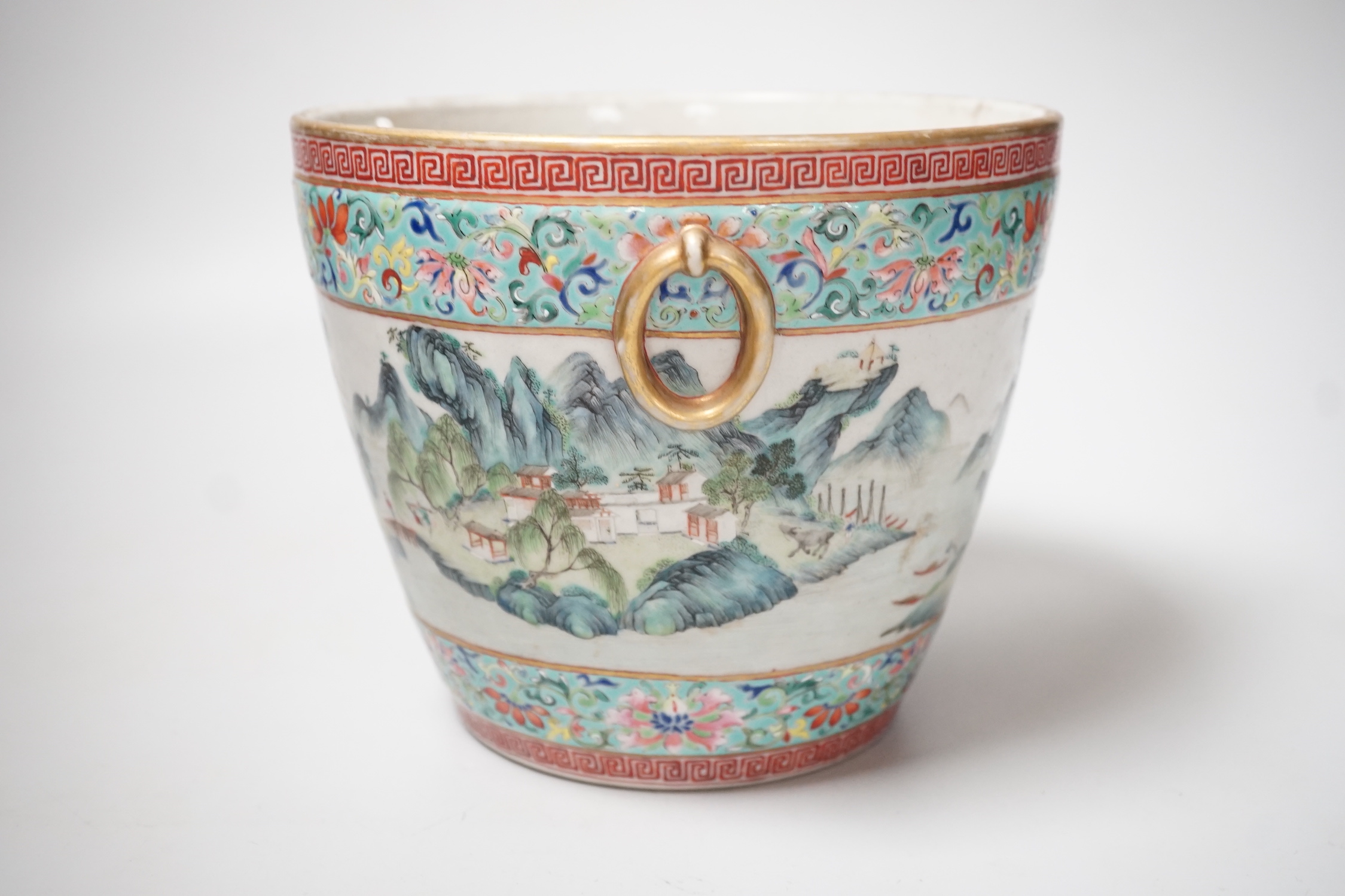 A 19th century Chinese famille rose ‘landscape’ planter, 15cm tall, rim crack